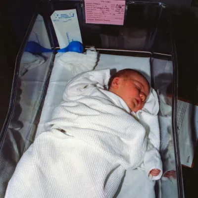 Newborn baby in hospital under observation for neonatal disorders